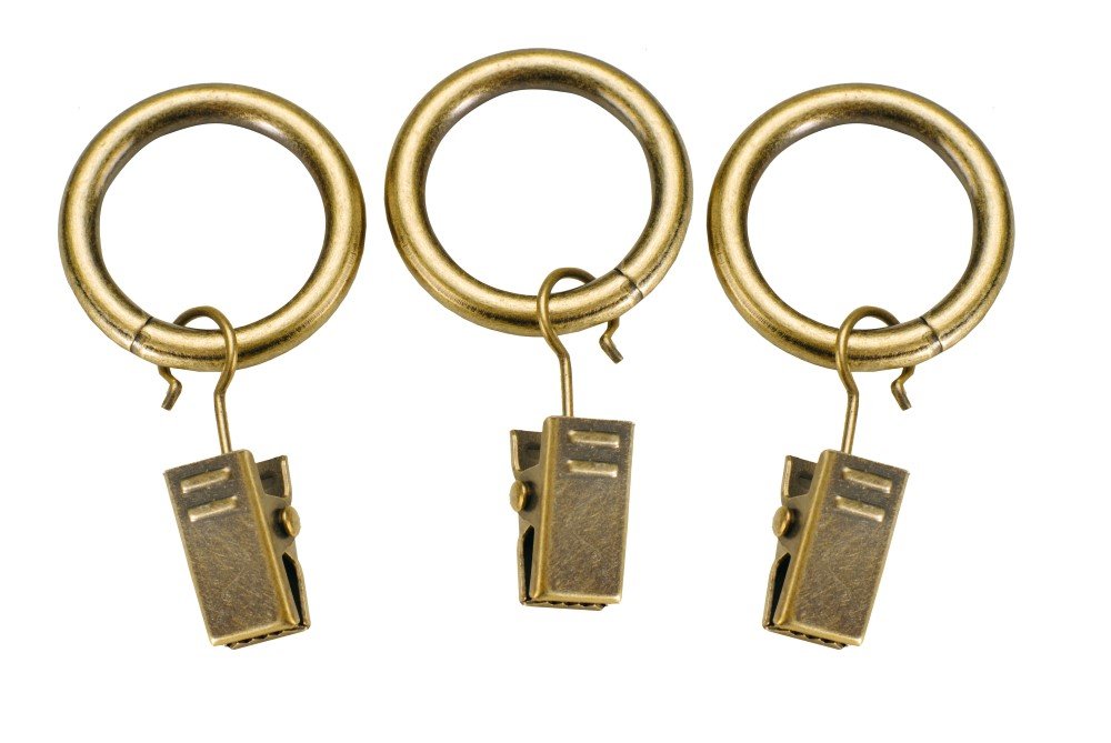 Karnizo žiedai STOL-KAR 10 Vnt., Metaliniai karnizo žiedai su segtukais. Skersmuo - 16/19 mm. Spalva - sendintas auksas. Paluotėje - 10vnt.