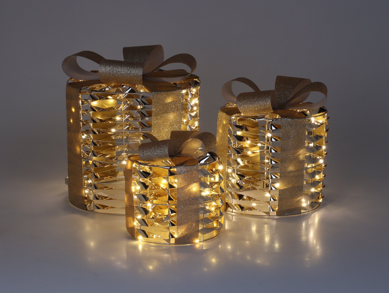 Kalėdinių LED dekoracijų rinkinys Dovanos, 3 vnt., aukso sp., šiltos sp. lemputės