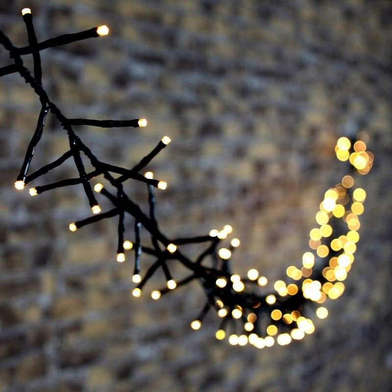 Šviečianti girlianda SUNLUX AE10, 1000 LED, IP44, spl. šiltai balta, 10 m